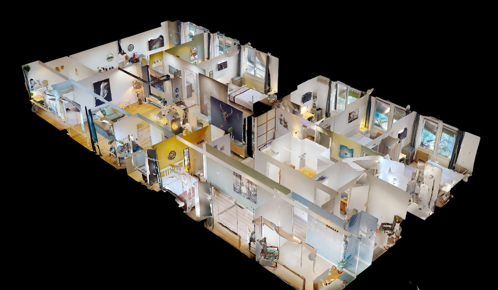 Vue en coupe de l'appartement vu du dessus, plafonds retirés, montrant la disposition des huit chambres
