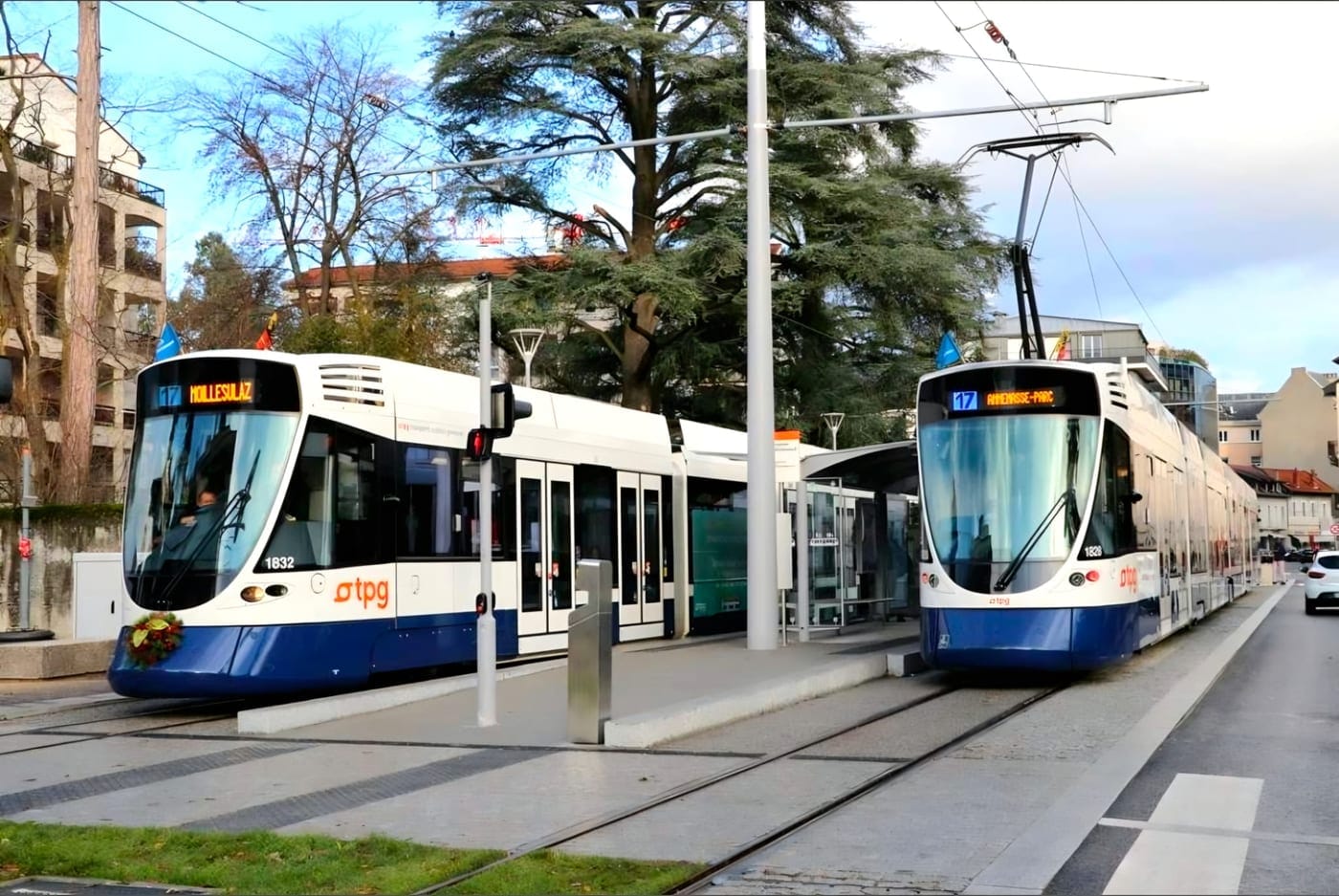 Two Geneva public transport tram 17 units at their Annemasse terminus, one showing 'Moillesulaz', the other 'Annemasse-Parc'